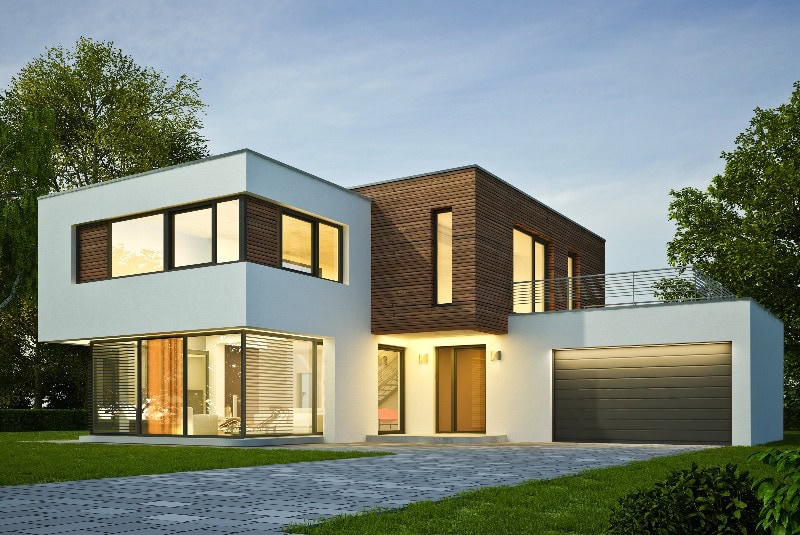 Haus Kubus mit Holzelementen am Abend